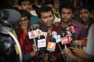 WITH MEDIA